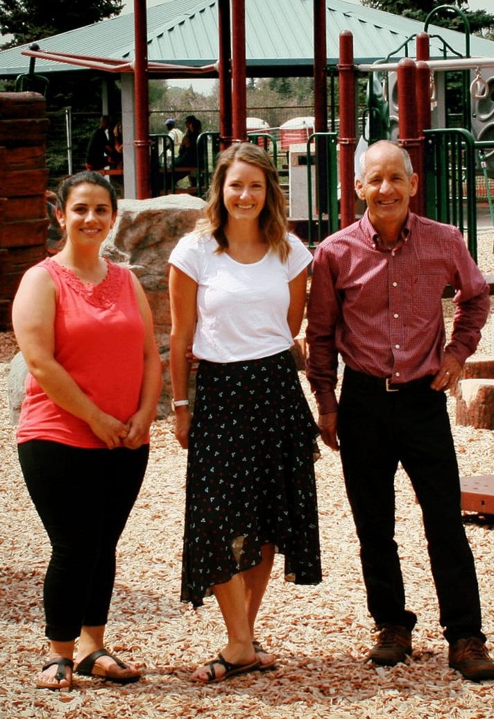 Team photo of Kylie Russell, Katie Hodgins, and Robert McCoy at the Argyll Community League in Edmonton, AB.