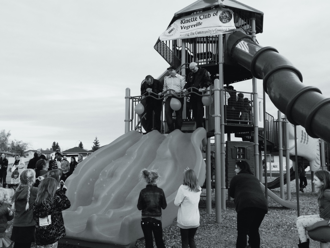 Black and white photo of the Kinette Playground grand opening in Vegreville, AB.