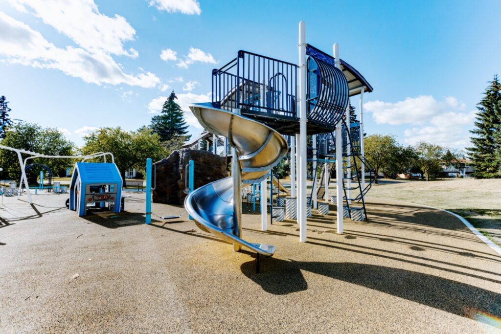 Albert G. Nickel Park-5 Albert G. Nickel Park in Edmonton, AB with Tot Builders Playhouse, Balance Board, Gibraltar Boulder, Stainless Steel Spiral Slide, Monkey Lean Out Rail, and Culvert Climbers.