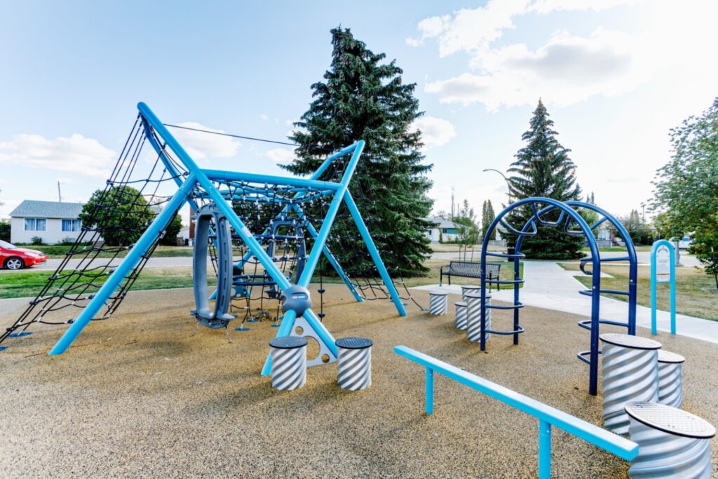 Albert G. Nickel Park-9 Albert G. Nickel Park in Edmonton, AB with close up view of Grand Strand, Culvert Climbers, Wiggly Worm Climber, Balance Beam, and Steel Park Bench.