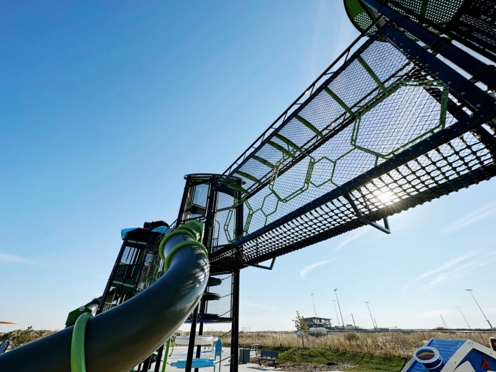 Pogadl Park-7 Pogadl Park in Sylvan Lake, AB with close up view of Extreme Generation Tower, Hurricane Tower, S-Shaped Tube Slide, Hives Skyway, and Tot Builders Playhouse.