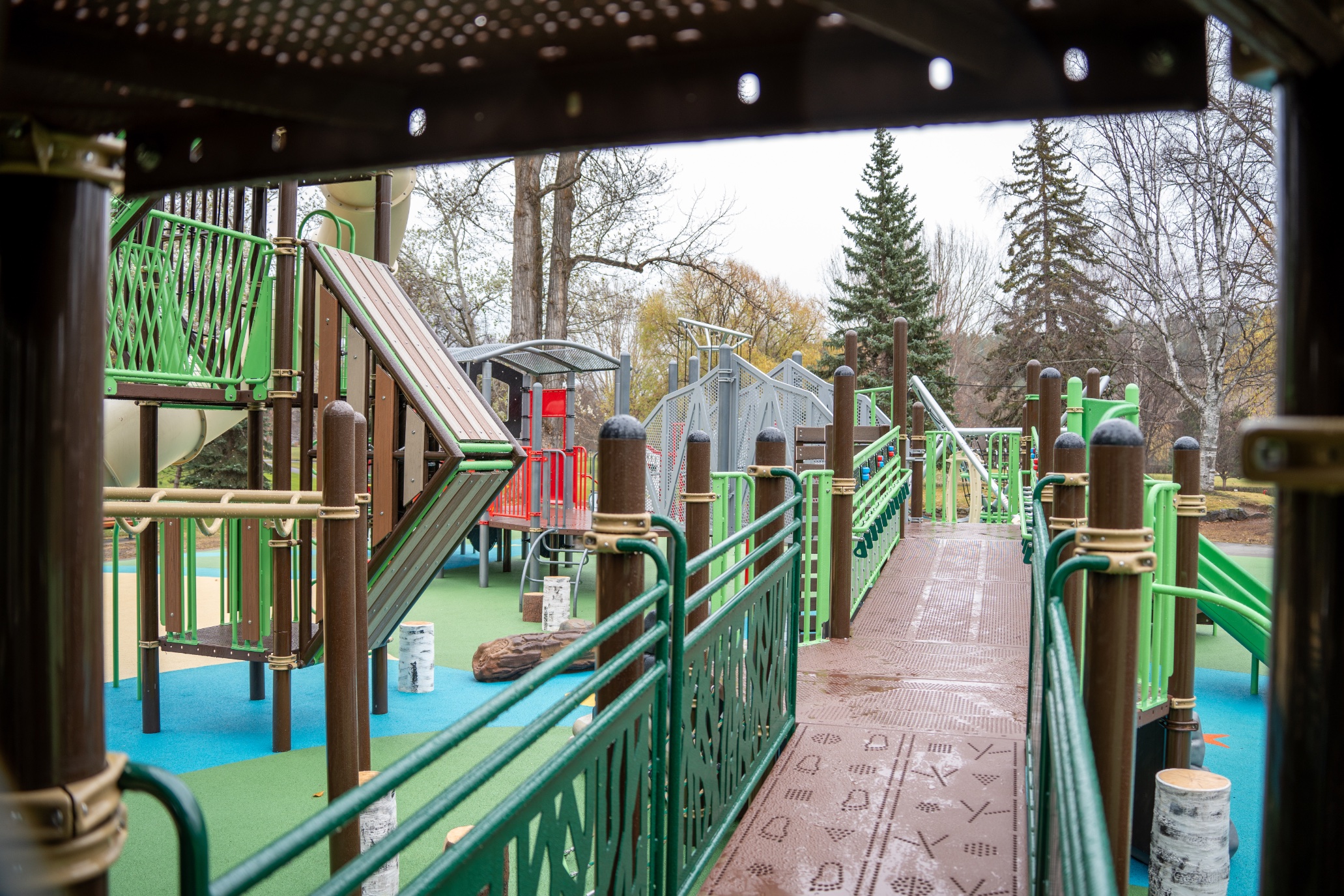 Accessible ramp with tactile animal tracks at Lheidli T'enneh Memorial Park in Prince George, BC.