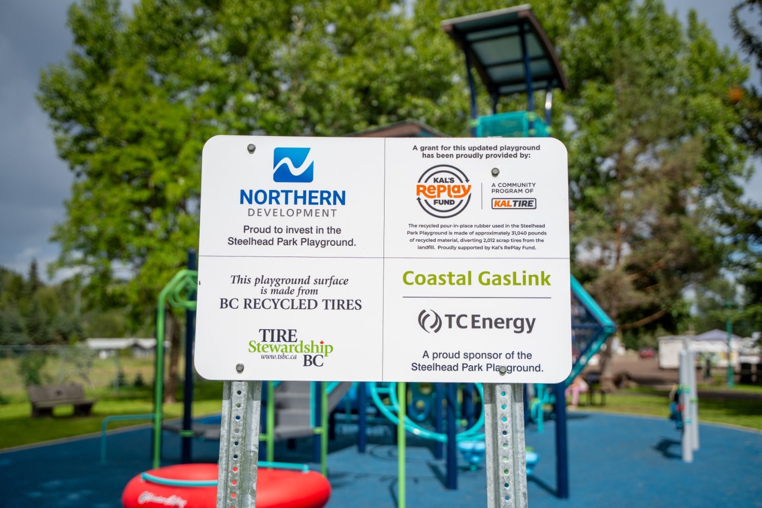 Sponsor sign for Steelhead Park's playground grant, useful reference for anyone researching how to get a playground grant.