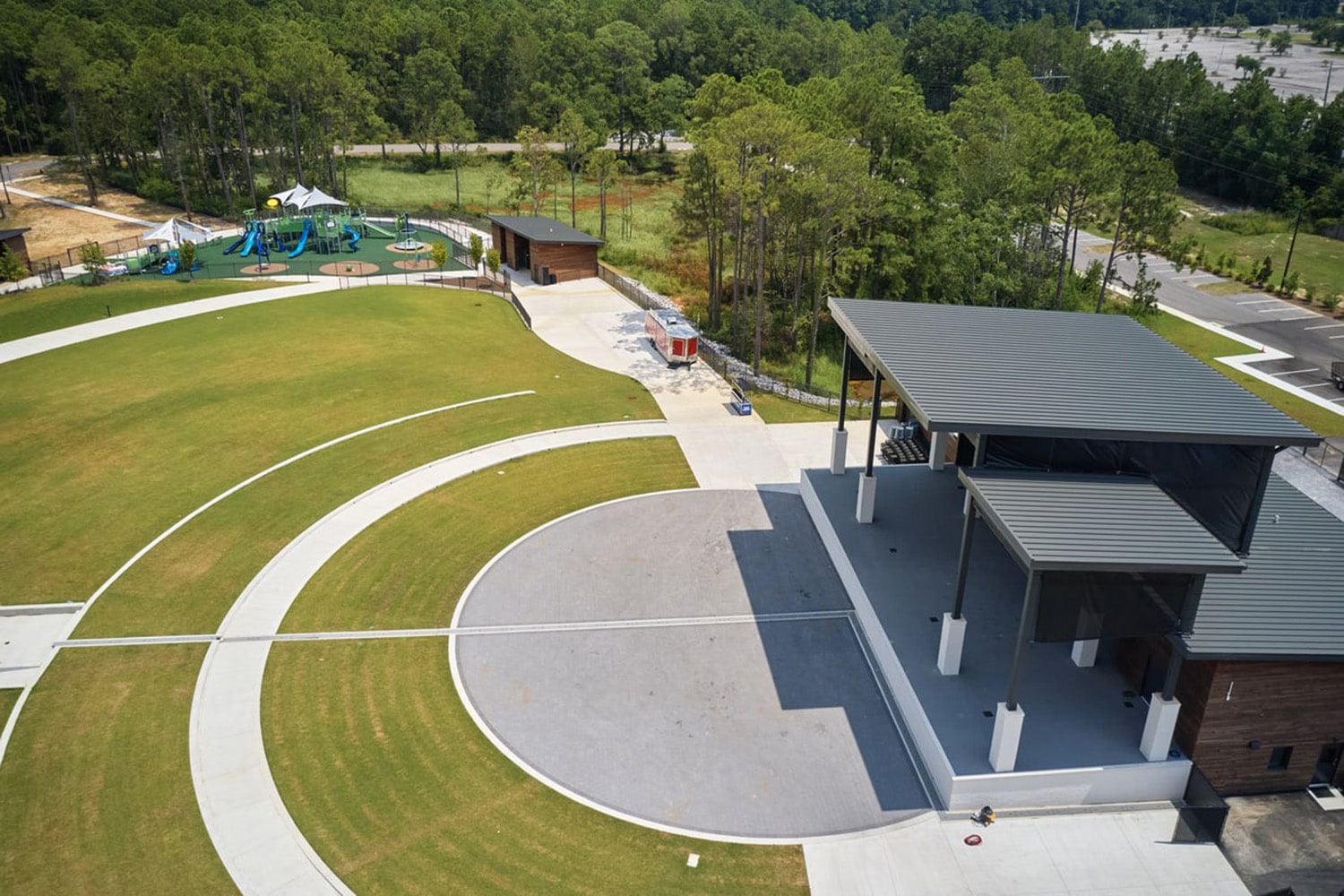 Aerial view of a park's playground and picnic shelter, illustrating priorities from a typical playground planning checklist.